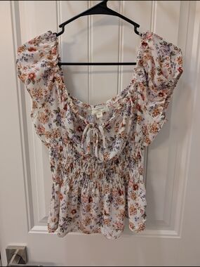 cupcakes and cashmere Cream Floral Smocked Peplum Blouse